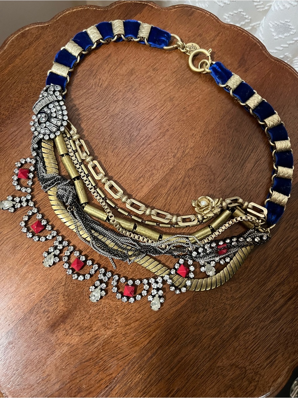 Juicy Couture Gold Tone Multi-Layer Necklace with Blue Ribbon and Red Accents